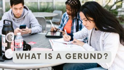 three friends studying english and practising gerunds
