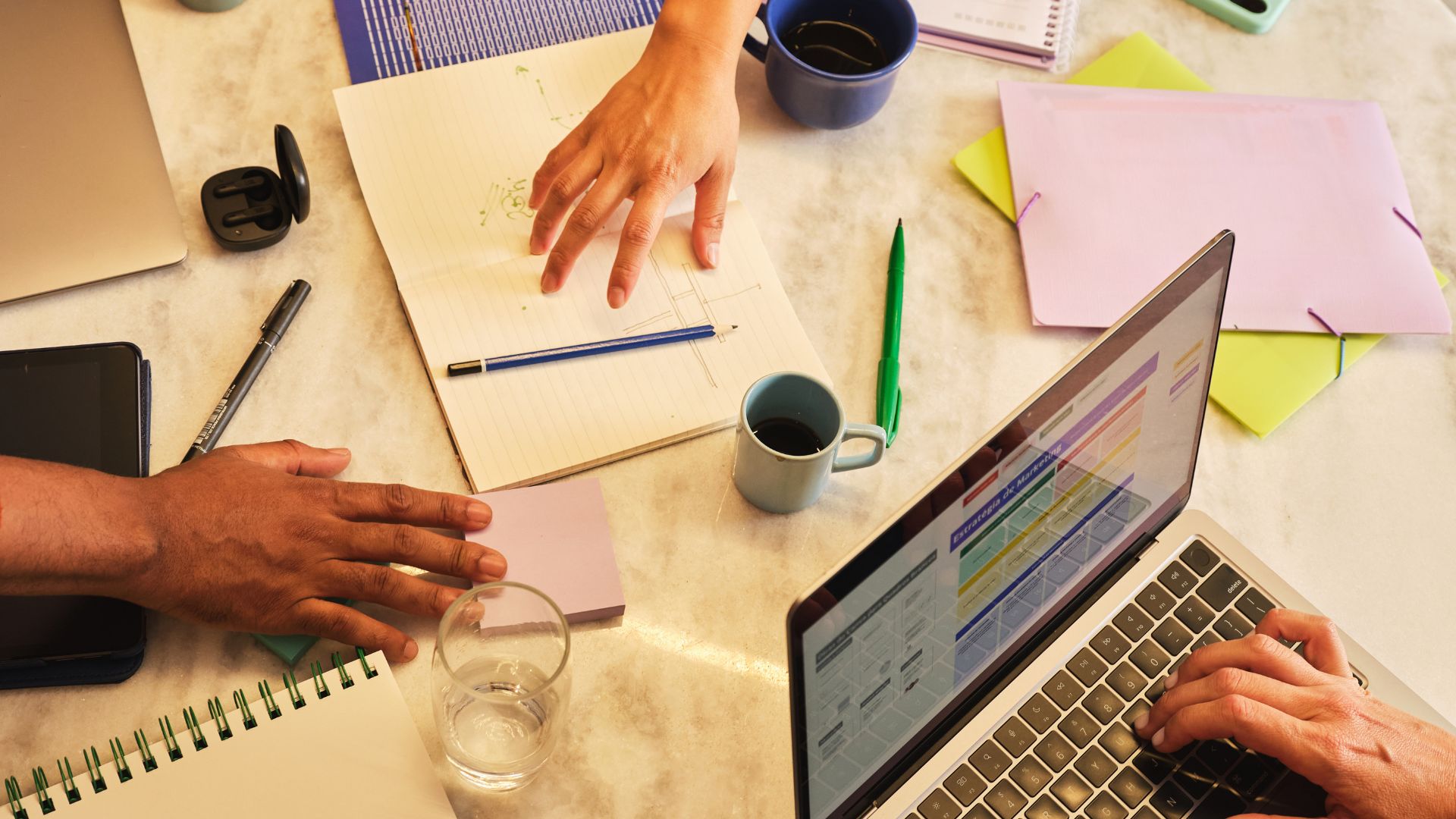 group so friends studying together with their laptops and notebooks