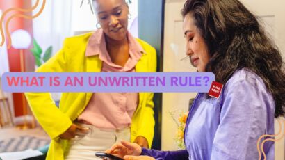 two women looking at some rules on a phone